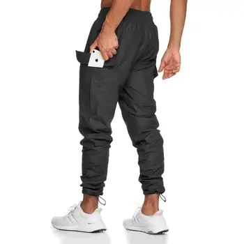Новые водонепроницаемые спортивные штаны Мужские штаны для бега с карманами на молнии Мужские брюки для тренировок и пробежек Спортивные штаны для фитнеса для мужчин